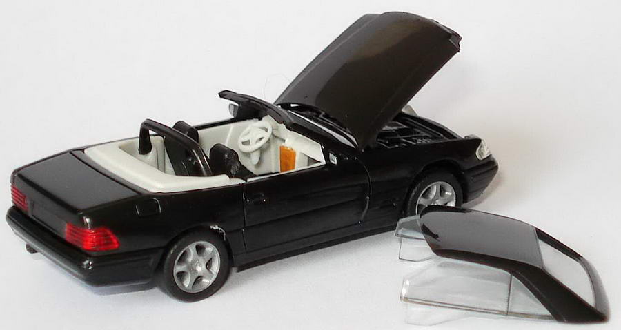 Foto 1:87 Mercedes-Benz SL 500 (R129, Modell 98) schwarz, IA hellgrau herpa 146555