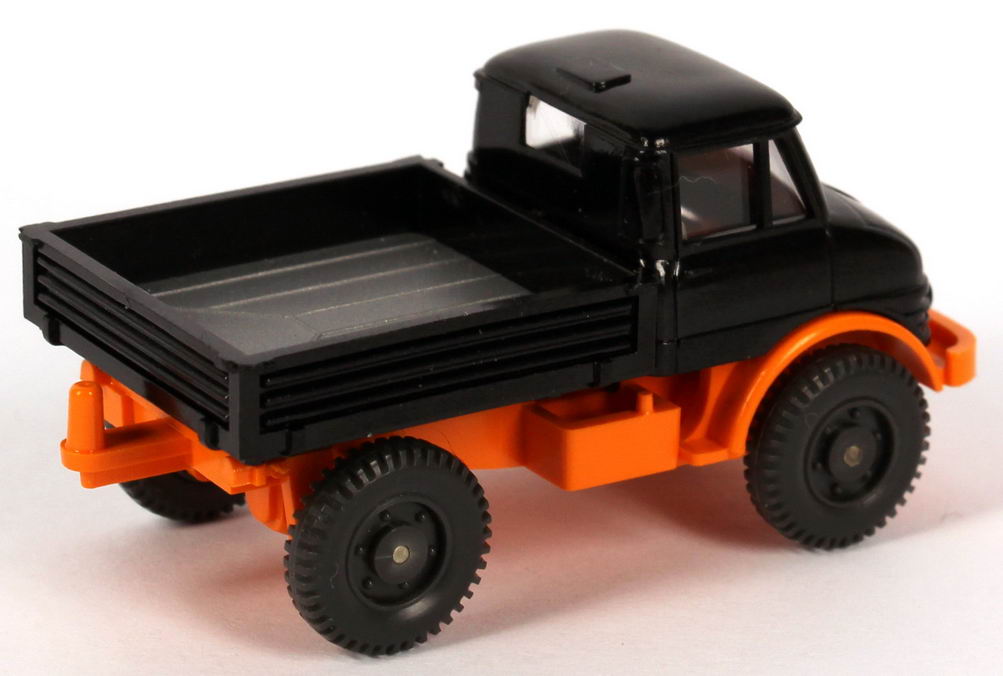 Foto 1:87 Mercedes-Benz Unimog U 406 schwarz/orange (IA ohne Lenkrad, Bp 370) Wiking 371