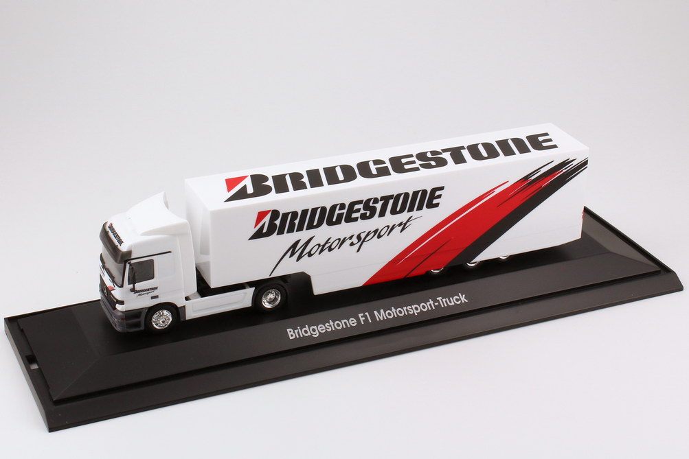 Foto 1:87 Mercedes-Benz Actros L Koffer-Sattelzug Bridgestone F1 Motorsport-Truck - herpa