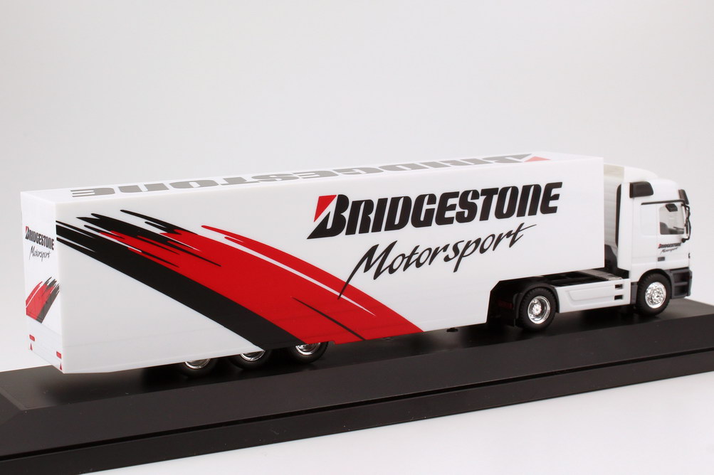 Foto 1:87 Mercedes-Benz Actros L Koffer-Sattelzug Bridgestone F1 Motorsport-Truck - herpa