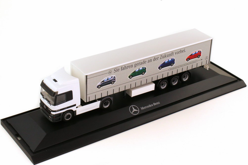 Foto 1:87 Mercedes-Benz Actros L Fv Cv GpSzg 2/3 Sie fahren gerade an der Zukunft vorbei - A-Klasse ab Herbst 1997 Werbemodell herpa B66000097