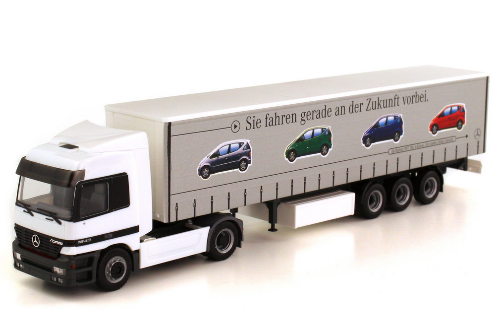 Foto 1:87 Mercedes-Benz Actros L Fv Cv GpSzg 2/3 Sie fahren gerade an der Zukunft vorbei - A-Klasse ab Herbst 1997 Werbemodell herpa B66000097