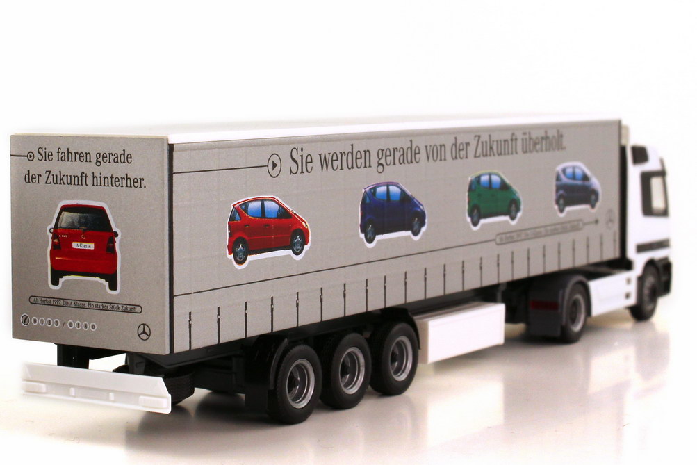 Foto 1:87 Mercedes-Benz Actros L Fv Cv GpSzg 2/3 Sie fahren gerade an der Zukunft vorbei - A-Klasse ab Herbst 1997 Werbemodell herpa B66000097