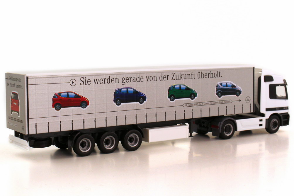 Foto 1:87 Mercedes-Benz Actros L Fv Cv GpSzg 2/3 Sie fahren gerade an der Zukunft vorbei - A-Klasse ab Herbst 1997 Werbemodell herpa B66000097