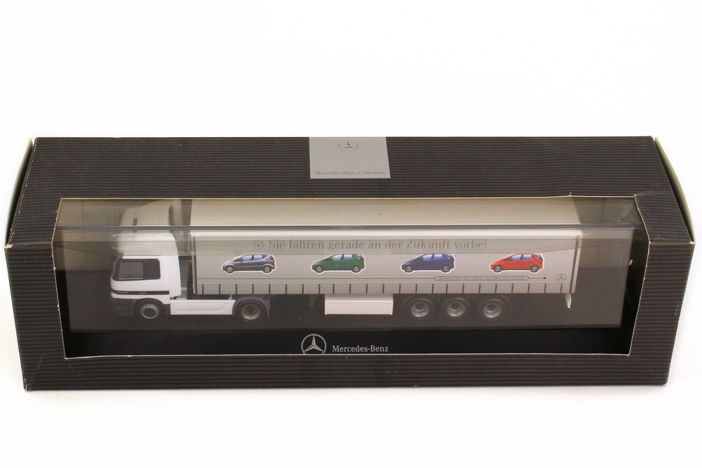 Foto 1:87 Mercedes-Benz Actros L Fv Cv GpSzg 2/3 Sie fahren gerade an der Zukunft vorbei - A-Klasse ab Herbst 1997 Werbemodell herpa B66000097