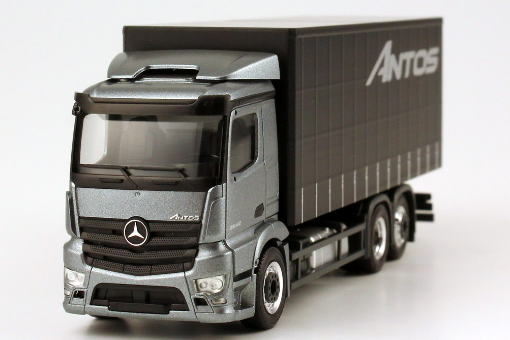 Foto 1:87 Mercedes-Benz Antos 3a GP-Lkw andorit-grau-met. Werbemodell - herpa B6 600 4091
