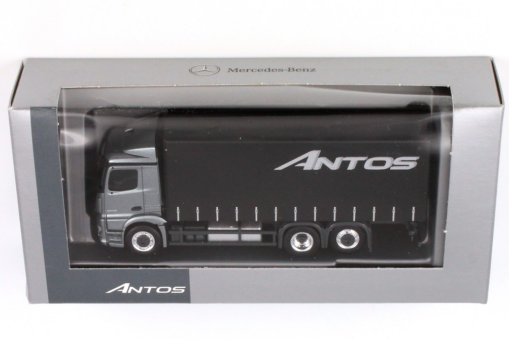 Foto 1:87 Mercedes-Benz Antos 3a GP-Lkw andorit-grau-met. Werbemodell - herpa B6 600 4091