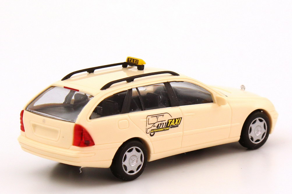 Foto 1:87 Mercedes-Benz C-Klasse T-Modell (S203) Taxi Autovermietung Hermann 4711 hellelfenbein Busch 49152
