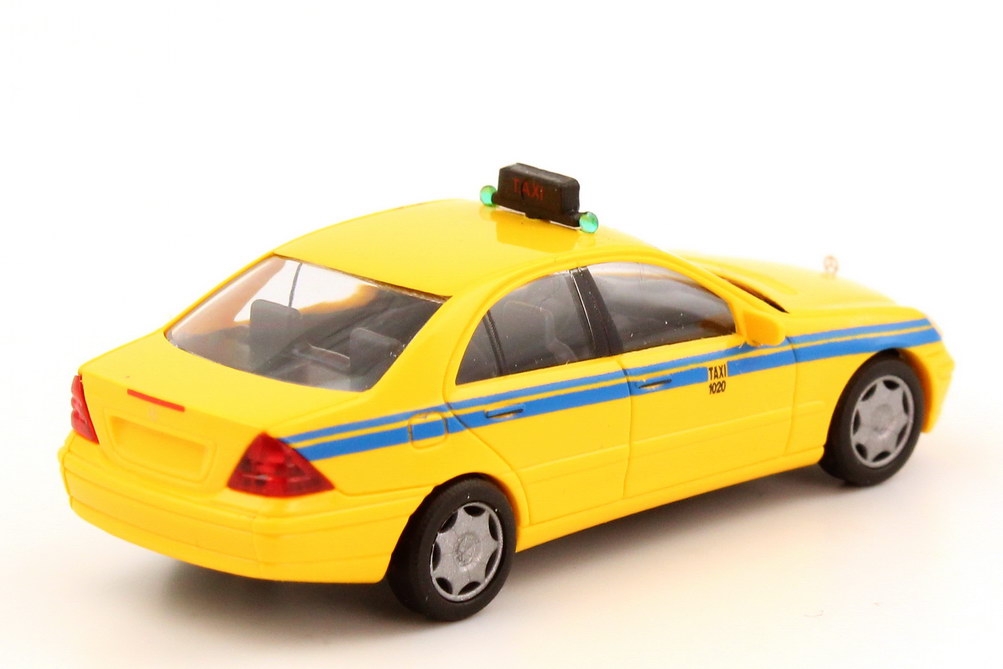 Foto 1:87 Mercedes-Benz C-Klasse (W203) Taxi gelb, Portugal Busch 49107