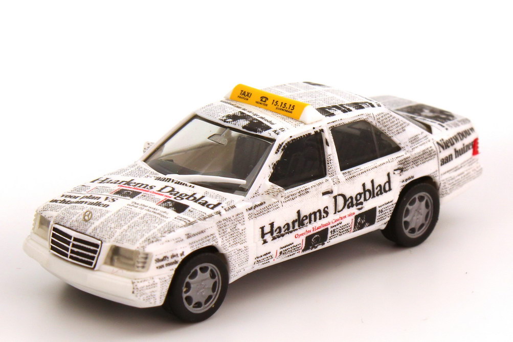 Foto 1:87 Mercedes-Benz E-Klasse E 320 (W124 MOPF II) Taxi Haarlems Dagblad (Niederlande) herpa