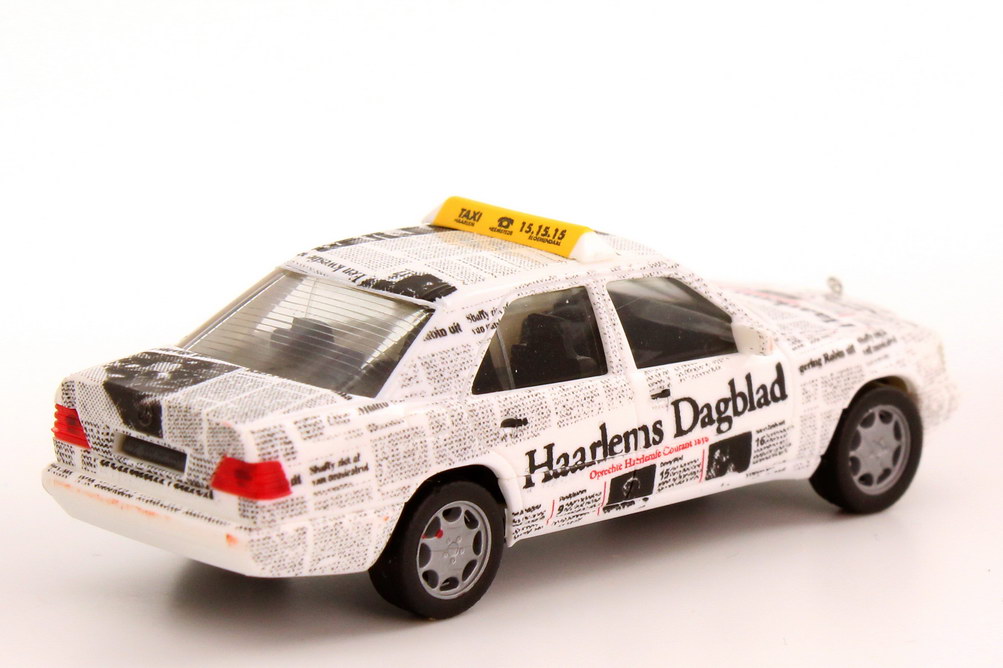 Foto 1:87 Mercedes-Benz E-Klasse E 320 (W124 MOPF II) Taxi Haarlems Dagblad (Niederlande) herpa
