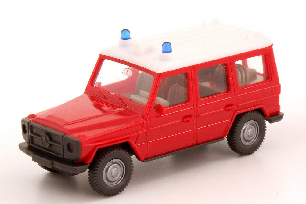 Foto 1:87 Mercedes-Benz G-Modell 230G lang (W460) Feuerwehr rot, Dach weiß Wiking 609