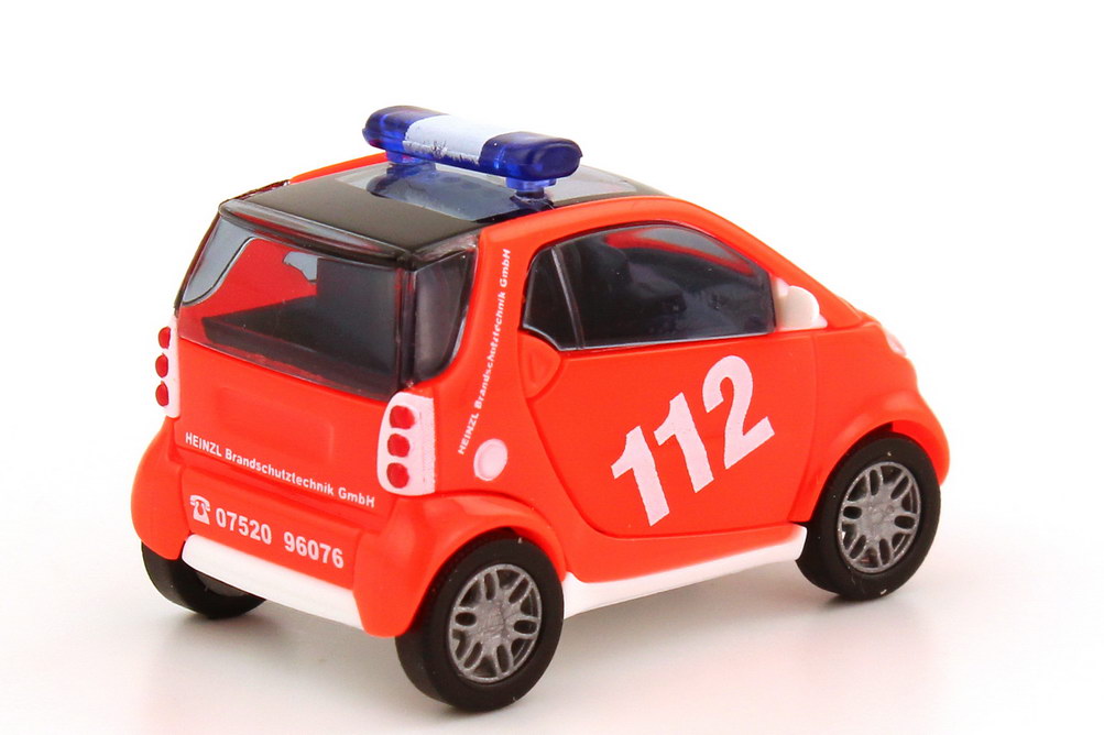 Foto 1:87 Smart City-Coupé Feuerwehr tagesleucht-rot Heinzl Brandschutztechnik Busch 48917