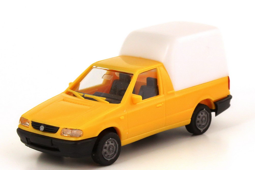 Foto 1:87 VW Caddy II Pickup (Typ 9U) apricot-gelb mit Ladeflächenaufsatz weiß CS-Train 97423