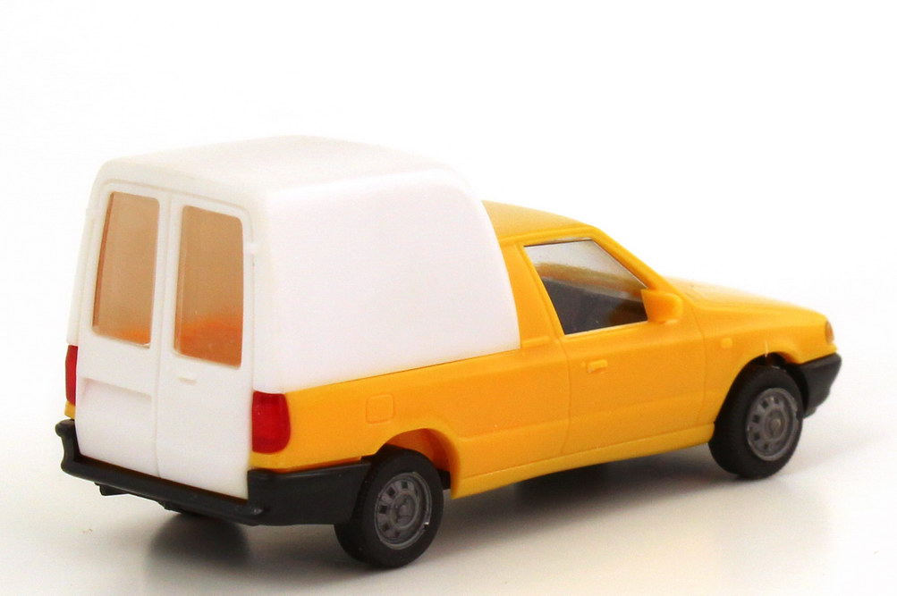 Foto 1:87 VW Caddy II Pickup (Typ 9U) apricot-gelb mit Ladeflächenaufsatz weiß CS-Train 97423