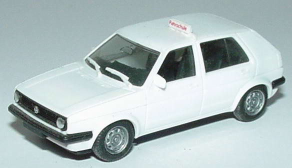 Foto 1:87 VW Golf II 4türig Fahrschule weiß herpa 4095