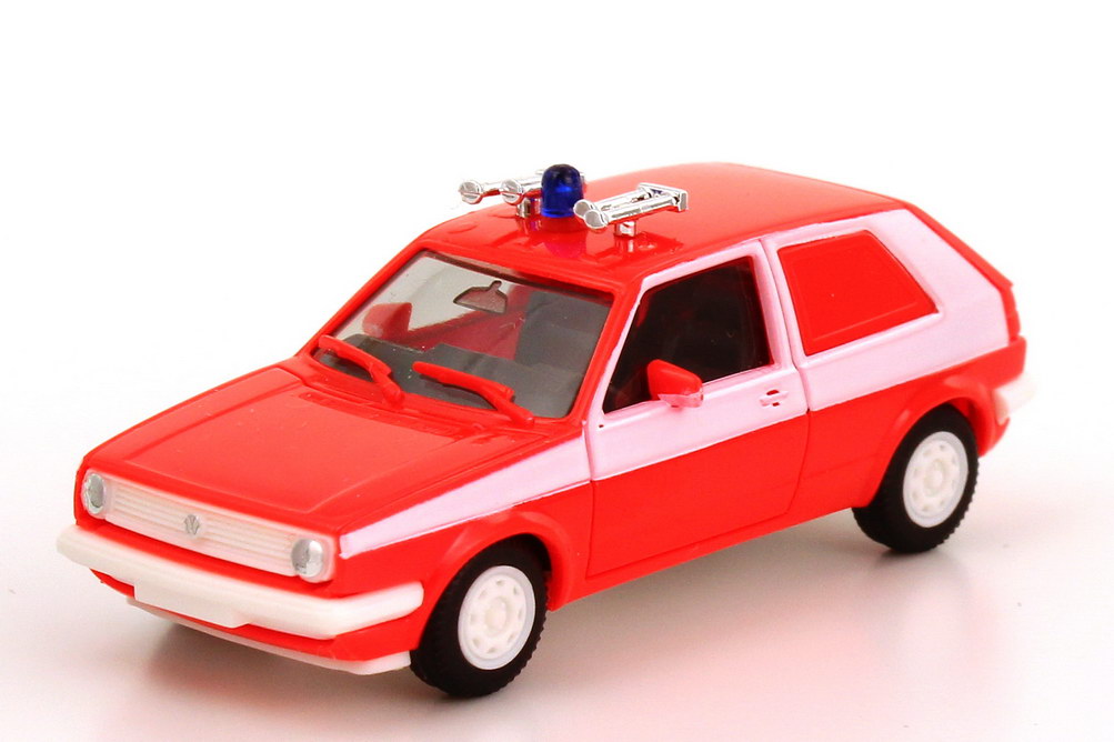 Foto 1:87 VW Golf II 2türig Lieferwagen Feuerwehr (mit Fanfaren) tagesleuchtrot/weiß Maag 700221