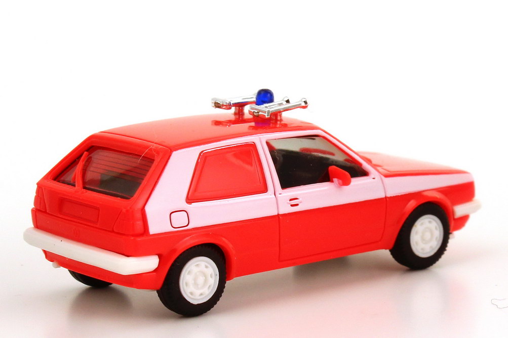 Foto 1:87 VW Golf II 2türig Lieferwagen Feuerwehr (mit Fanfaren) tagesleuchtrot/weiß Maag 700221