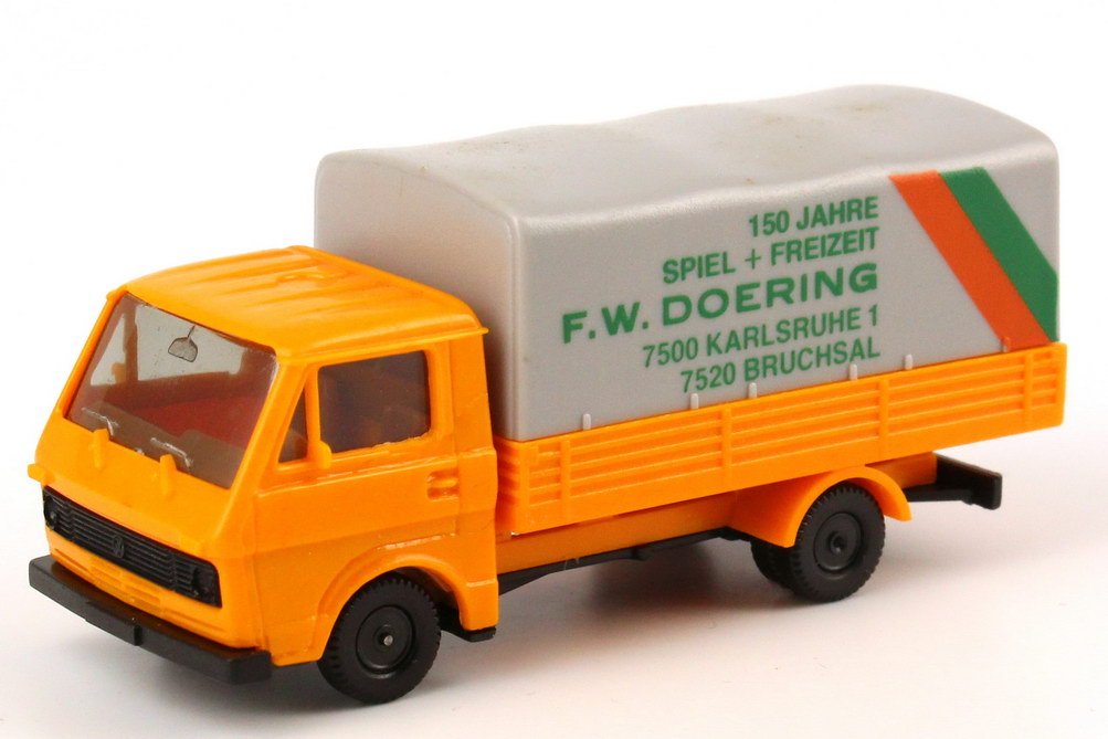 Foto 1:87 VW LT 28 Pritsche/Plane 150 Jahre Spiel + Freizeit F.W. Doering, Karlsruche + Bruchsal herpa
