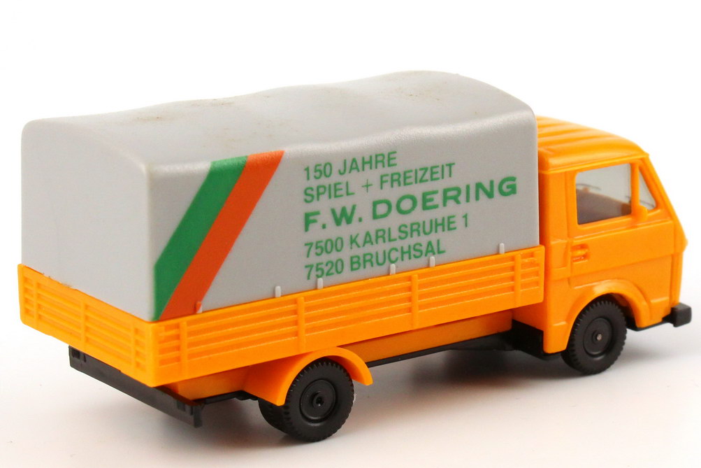 Foto 1:87 VW LT 28 Pritsche/Plane 150 Jahre Spiel + Freizeit F.W. Doering, Karlsruche + Bruchsal herpa