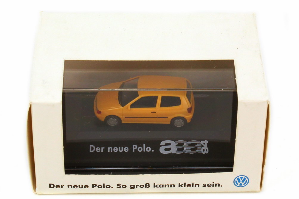 Foto 1:87 VW Polo (6N) 2türig apricot-orange Der neue Polo, aaa 94 Werbemodell herpa