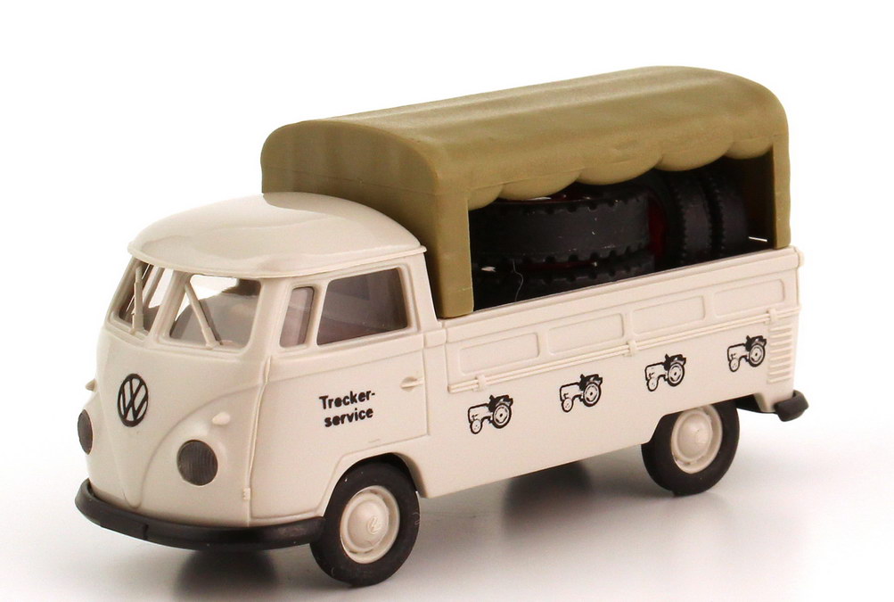 Foto 1:87 VW T1 (T1b) Pritsche/Plane Trecker-Service mit Ladegut Unimog-Reifen Brekina 32819