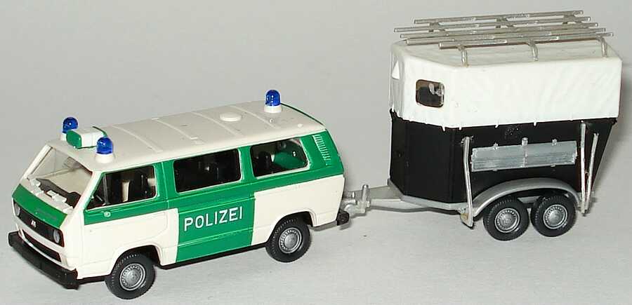Foto 1:87 VW T3 Bus Polizei grün/weiß mit Pferdetransportanhänger Roco