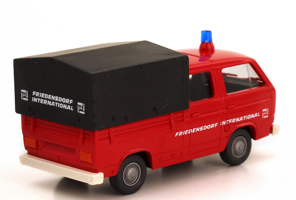 Foto 1:87 VW T3 Doka Pritsche/Plane Feuerwehr rot Friedensdorf International Roco 9302