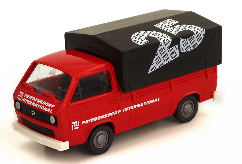 Foto 1:87 VW T3 Pritsche/Plane rot 25 Jahre Friedensdorf International Roco AusSet9901