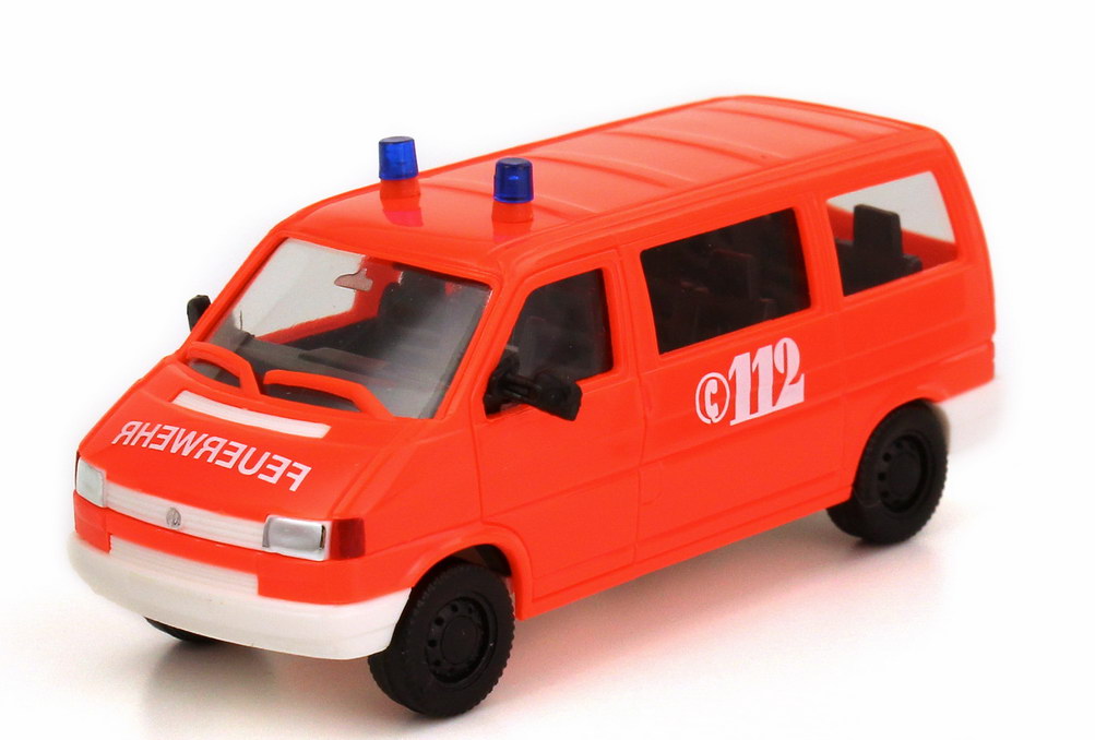 Foto 1:87 VW T4 Caravelle Feuerwehr tagesleuchtrot herpa 043120