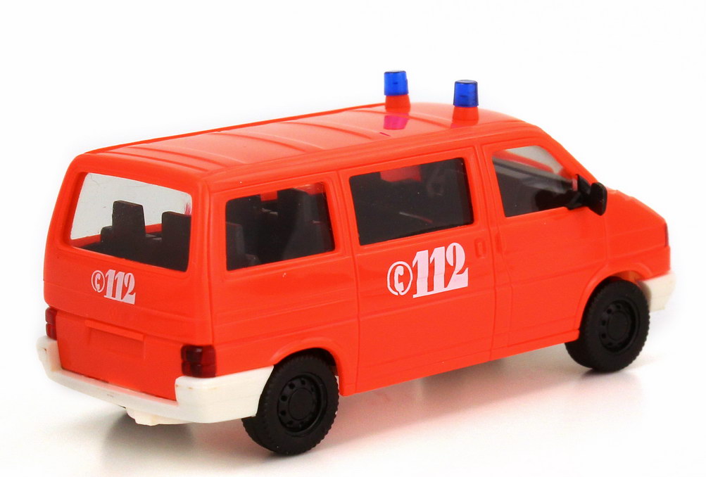 Foto 1:87 VW T4 Caravelle Feuerwehr tagesleuchtrot herpa 043120