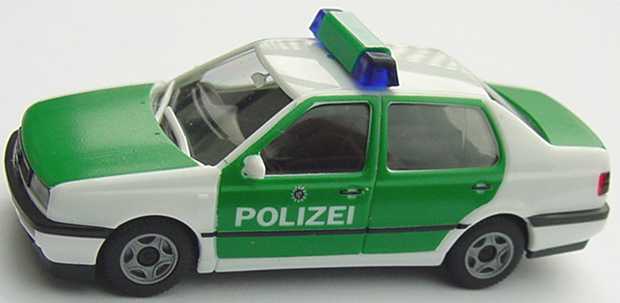 Foto 1:87 VW Vento Polizei Sachsen herpa 043090
