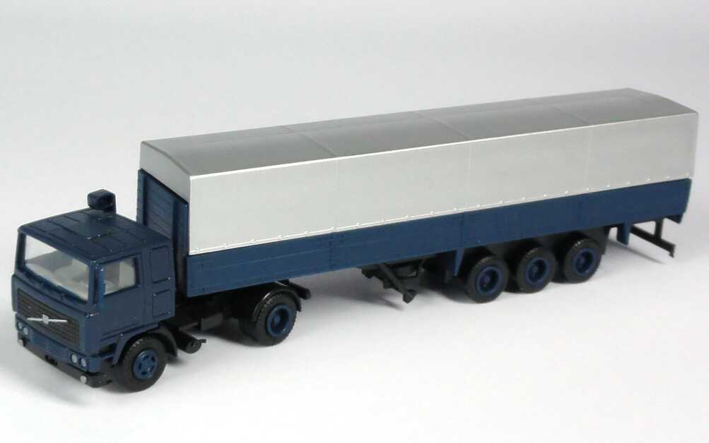 Foto 1:87 Volvo F10 PPSzg 2/3 dunkelblau/silber (angegossene Spiegel, Volvo-Verpackung) herpa 280586